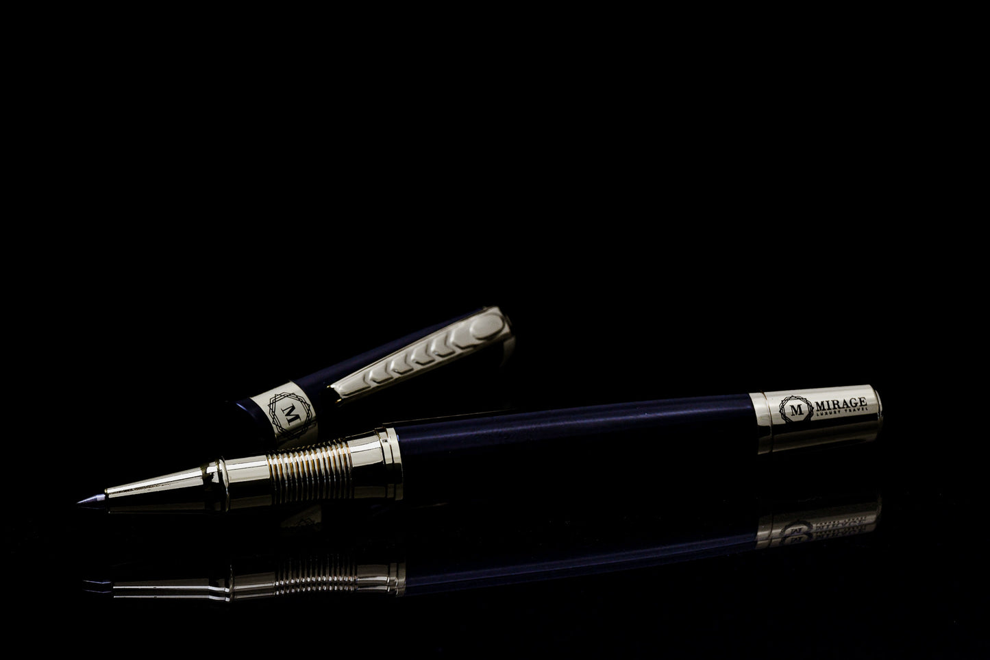 Close-up of the Mirage Luxury Travel Splendor Black luxury pen showcasing the premium stainless steel construction, gold-tone accents, and precision writing tip.