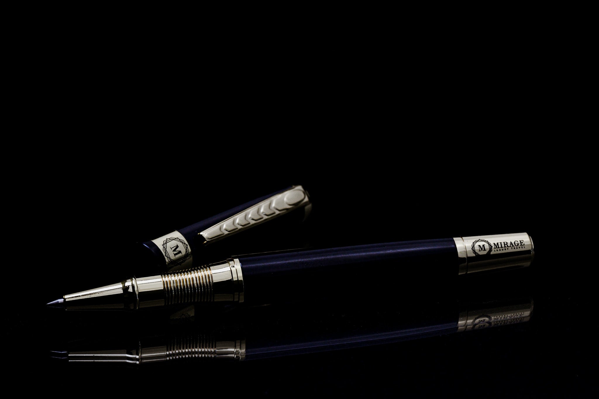 Close-up of the Mirage Luxury Travel Splendor Black luxury pen showcasing the premium stainless steel construction, gold-tone accents, and precision writing tip.
