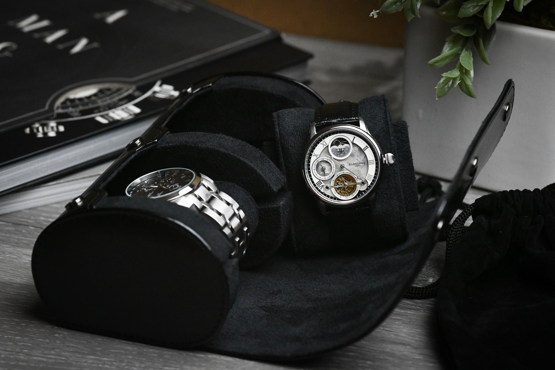 Luxury watches displayed inside the Super Black vegan leather 2 watch travel case with soft suede interior.