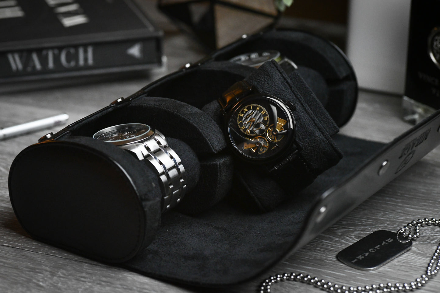 Open Super Black premium vegan leather 3 watch roll displaying luxury watch storage compartments