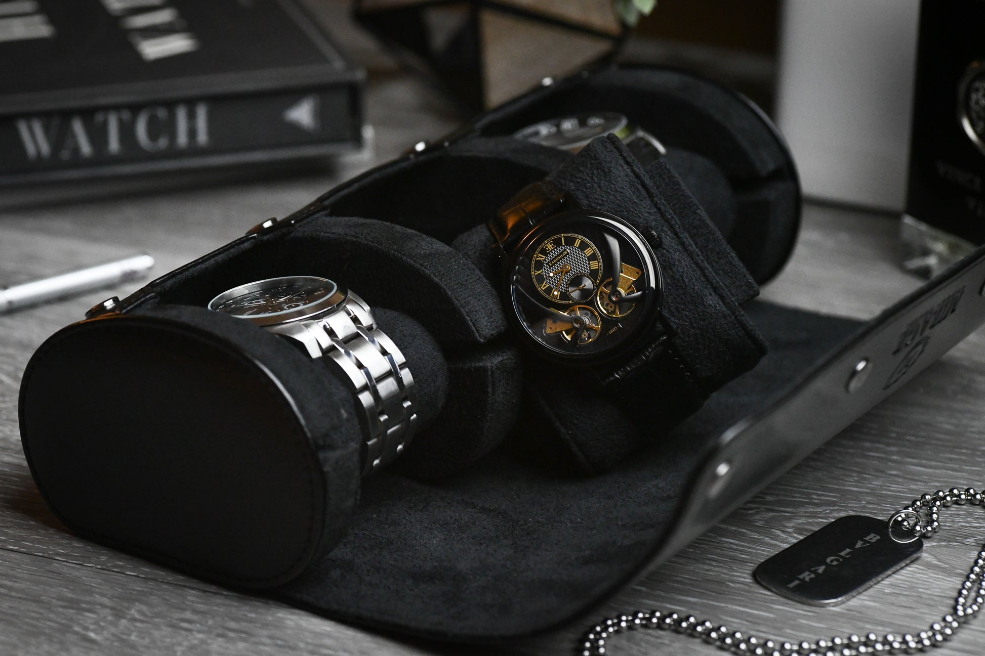 Open Super Black premium vegan leather 3 watch roll displaying luxury watch storage compartments