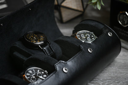 Luxury watches secured inside the Super Black 3 watch roll with soft suede watch cushions