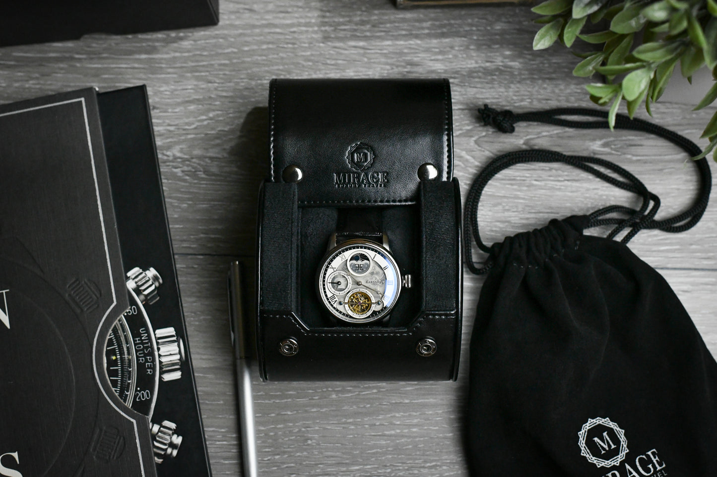 Luxury watch displayed inside the Super Black vegan leather watch roll with plush suede interior.