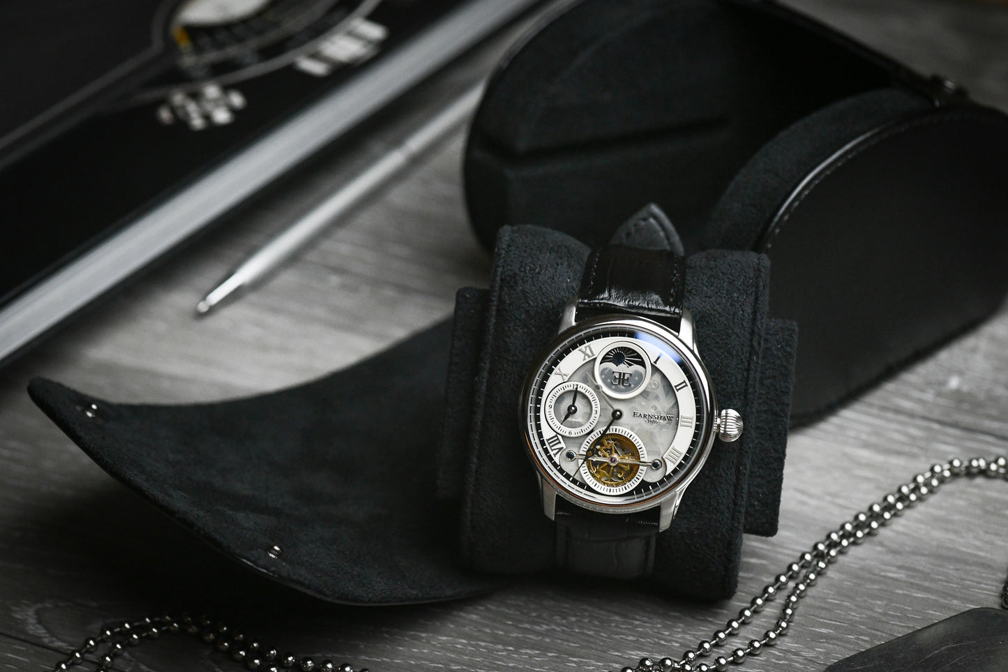 Super Black vegan leather 1 watch roll displayed with a luxury watch and premium accessories.