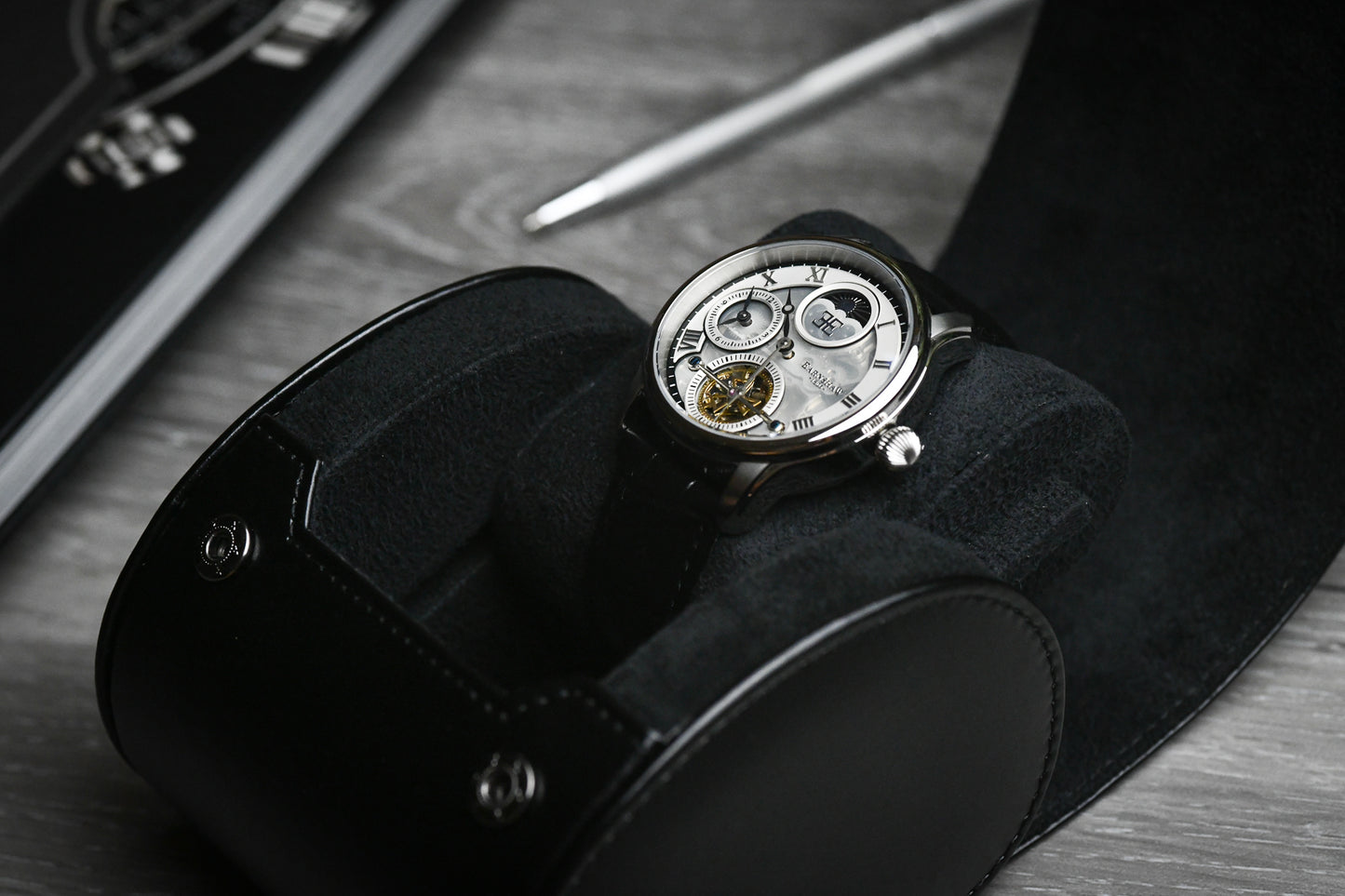 Side profile of the Super Black vegan leather 1 watch roll highlighting premium craftsmanship and secure watch protection.