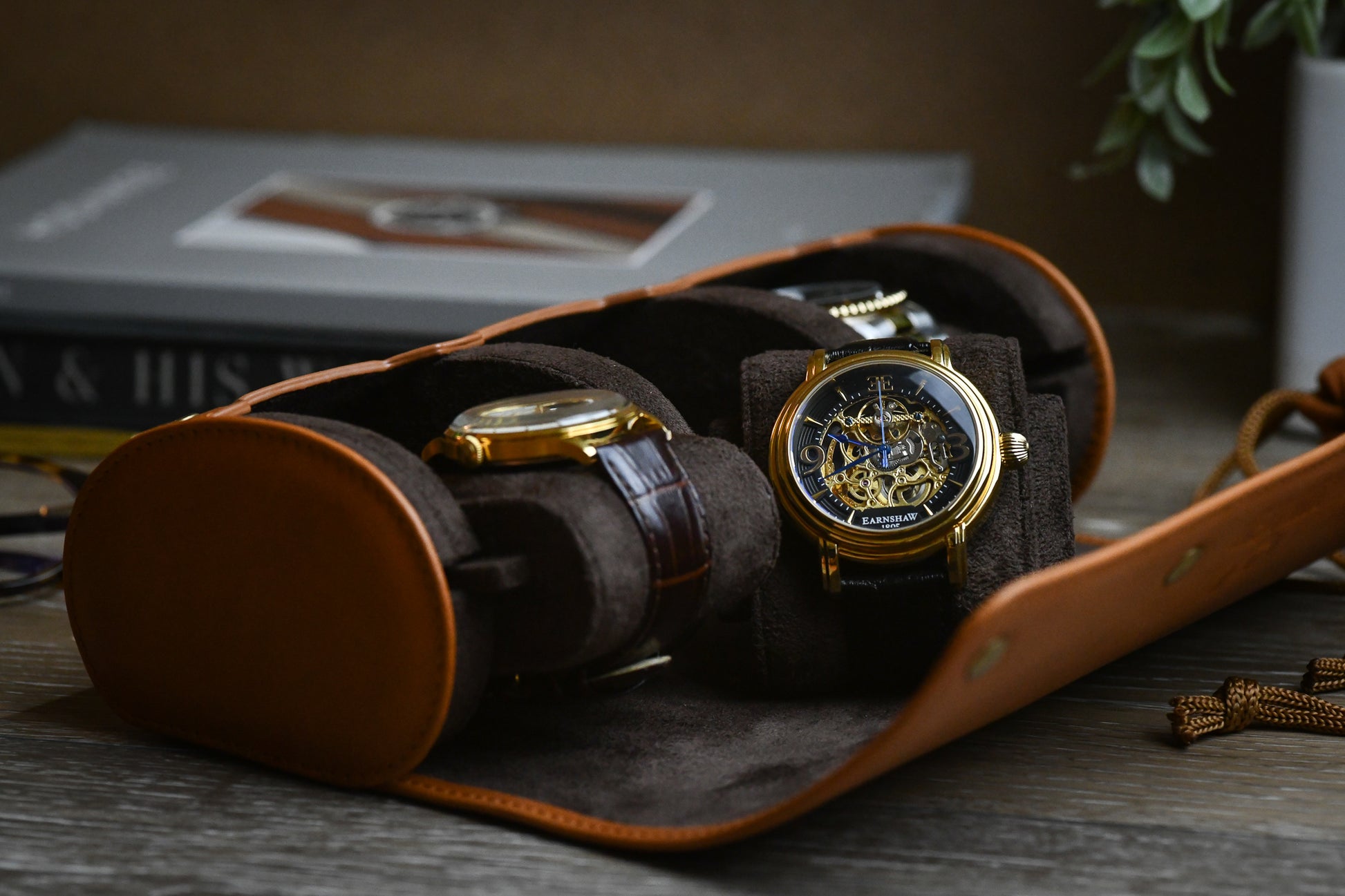 Luxury 3 watch travel case opened to reveal plush suede lining and securely stored luxury watches.