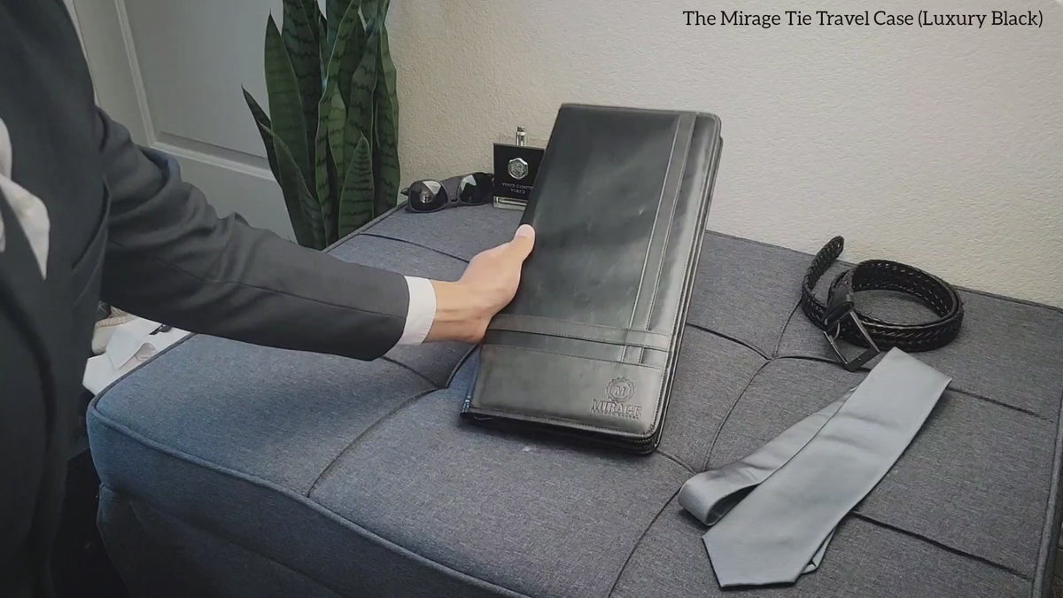 Product video showcasing the Graphite Black premium vegan leather tie travel case, highlighting travel-ready organization and premium craftsmanship.