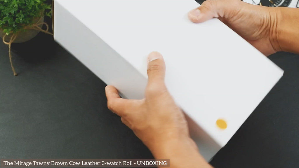 Premium unboxing experience of the Mirage Luxury Travel 3 watch roll with elegant gift-ready packaging.